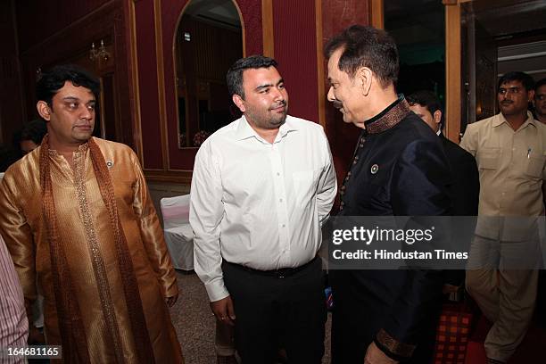 Subrata Roy with shooter Gagan Narang during Annaprashan ceremony of his granddaughter Roshna on March 20, 2013 in New Delhi, India.