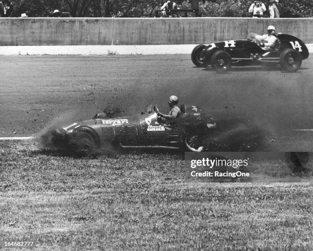 May 30, 1952: Italian driver Alberto Ascari slides into the grass after breaking a wheel on lap 40 of the Indianapolis 500 AAA Indy Car race at the...