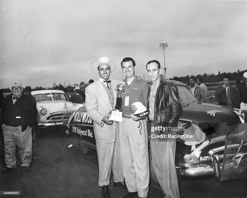 Carrell Raceway Frank “Rebel” Mundy is joined by his car owner and race promoter J ...
