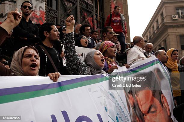 Group of Egyptian protesters gather in front of Cairo's High Court to protest against the summons of five high profile activists on March 26, 2013 in...