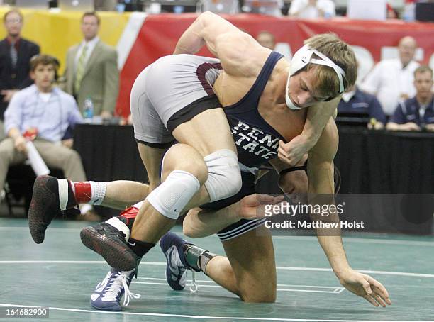 Des Moines, IADavid Taylor of the Penn State Nittany Lions wrestles Peter Yates of the Virginia Tech Aggies in their 165-pound semifinal match at the...
