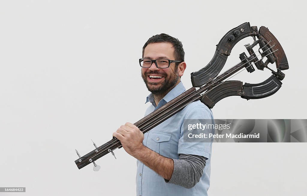 Mexican Artist Pedro Reyes Rehearses Using Musical Instruments He Has Created From Weapons Confiscated From Mexican Cartels