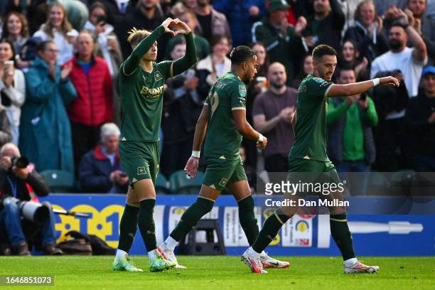Ben Waine of Plymouth Argyle celebrates after scoring the team's first goal during the Carabao Cup Second Round match between Plymouth Argyle and...