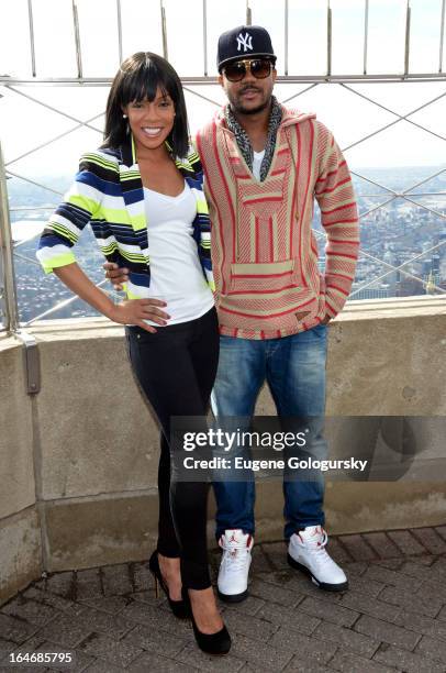 Hosea Chanchez and Wendy Raquel Robinson visit at The Empire State Building on March 26, 2013 in New York City.