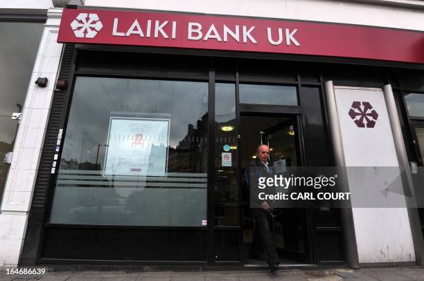 Man leaves a branch of Laiki Bank UK, a subsiduary of Cyprus Popular Bank , in north London on March 26, 2013. British Chancellor of the Exchequer...