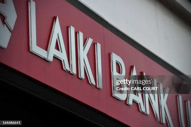 General view shows signage outside a branch of Laiki Bank UK, a subsiduary of Cyprus Popular Bank , in north London on March 26, 2013. British...