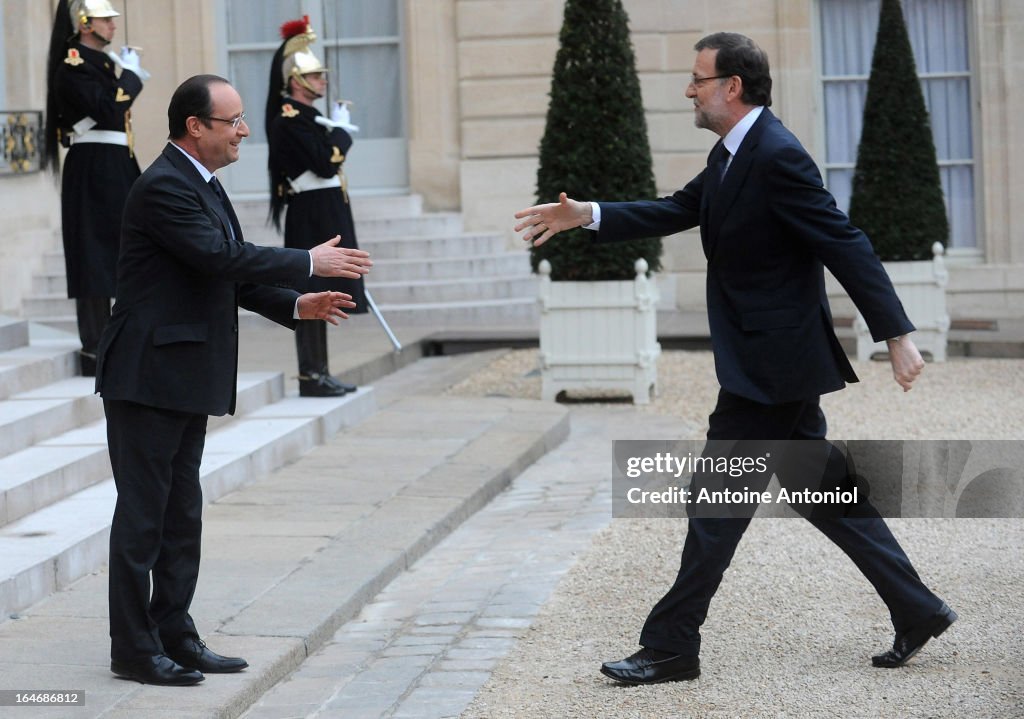 French President Francois Hollande Receives Spanish Prime Minister Mariano Rajoy In Paris
