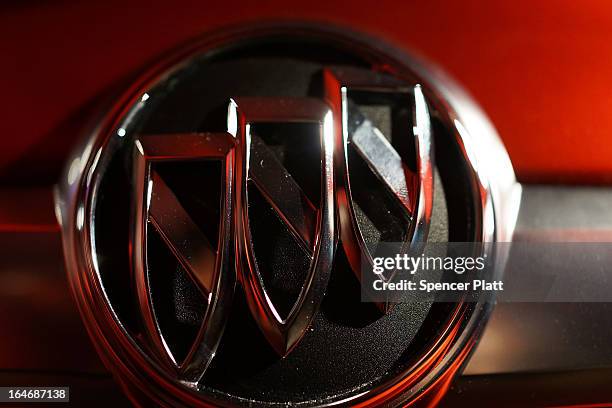 The Buick brand logo is displayed on a new 2014 Buick Regal GS at a launch party for new versions of General Motors Company Buick brand cars on March...