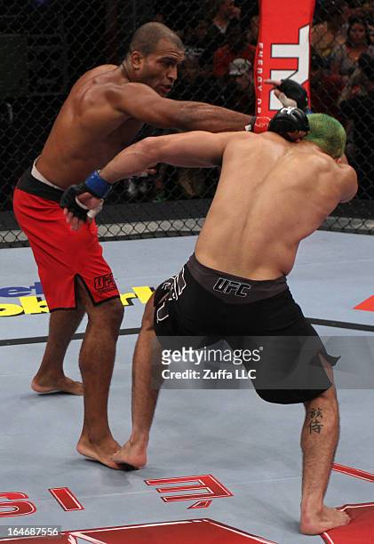 Cleiton "Foguete" Duarte punches Bruno "Jacare" Dias in their elimination fight during filming of season two of The Ultimate Fighter Brazil on...