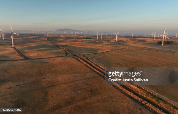 In an aerial view, windmills are seen near parcels of land that were recently purchased on August 29, 2023 near Rio Vista, California. Silicon Valley...