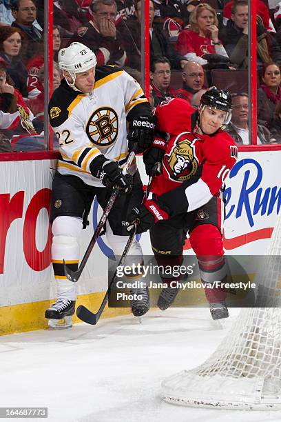 Mike Lundin of the Ottawa Senators battles for position against Shawn Thornton of the Boston Bruins, during an NHL game, at Scotiabank Place, on...