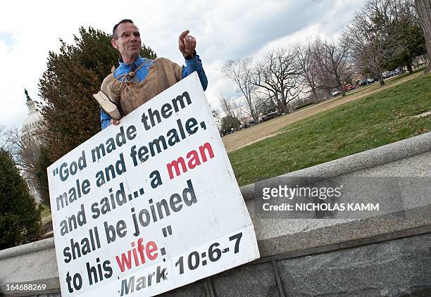 Same-sex marriage opponent Alan Hoyle of the Wake Up Call Ministry argues with supporters of same-sex marriage across from the US Supreme Court in...