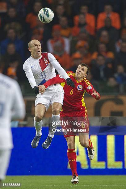 Arjan Robben of Holland, Vlad Iulian Chirches of Romania during the FIFA 2014 World Cup qualifier match between the Netherlands and Romania at the...