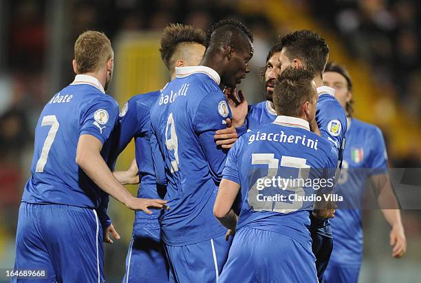 Mario Balotelli of Italy celebrates scoring the first goal during the FIFA 2014 World Cup qualifier match between Malta and Italy at Ta Qali Stadium...