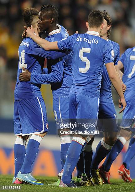 Mario Balotelli of Italy celebrates scoring the first goal during the FIFA 2014 World Cup qualifier match between Malta and Italy at Ta Qali Stadium...