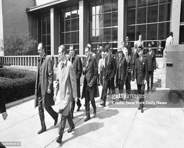 The 12 men of the Alice Crimmins jury are escorted to lunch.