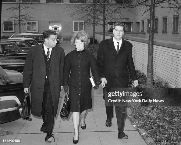 Attorney Harold Harrison, Alice Crimmins and her husband Edmund leave