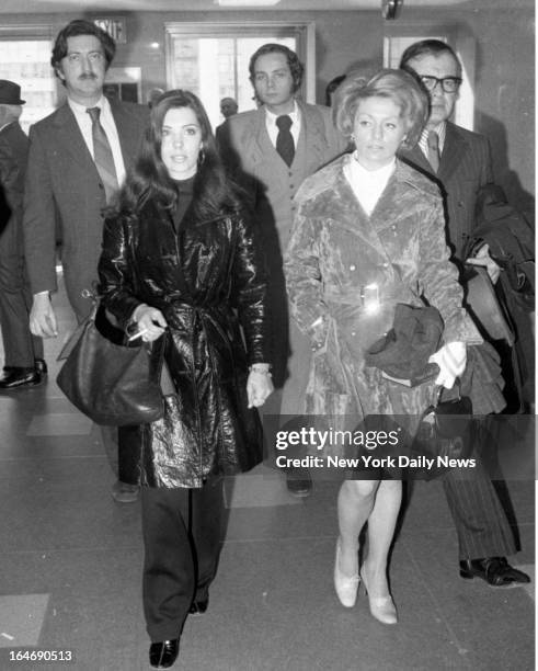 Witness Mrs. Betty Weinstein and Alice Crimmins walk from court after session.