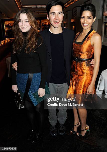 Alice Englert, Lazaro Hernandez and Freida Pinto attend a dinner hosted by online luxury fashion retailer NET-A-PORTER to celebrate designers Jack...