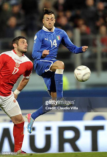 Stephan El Shaarawy of Italy and Ryan Camilleri of Malta compete for the ball during the FIFA 2014 World Cup qualifier match between Malta and Italy...