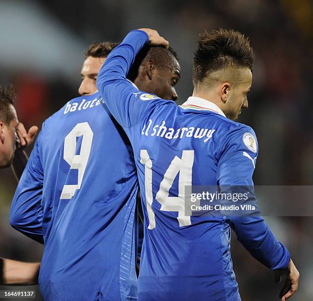 Mario Balotelli of Italy celebrates scoring his team's second goal with team-mate Stephan El Shaarawy during the FIFA 2014 World Cup qualifier match...