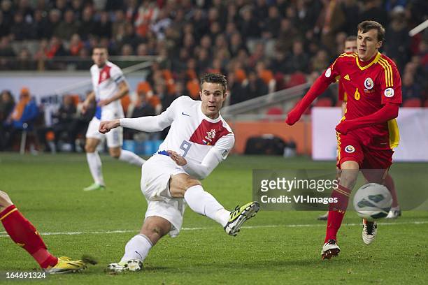 Robin van Persie of Holland, Vlad Iulian Chirches of Romania during the FIFA 2014 World Cup qualifier match between the Netherlands and Romania at...