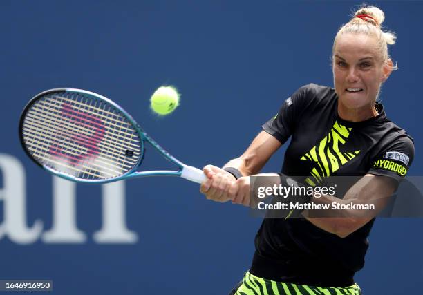 Arantxa Rus of the Netherlands returns a shot Madison Keys of the United States during their Women's Singles First Round match on Day Two of the 2023...