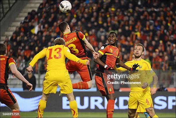 Thomas Vermaelen and Christian Benteke of Belgium in action during the FIFA 2014 World Cup Group A qualifying match between Belgium and Macedonia at...