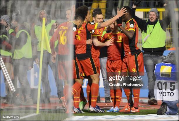 Eden Hazard of Belgium celebrates with his team-mates during the FIFA 2014 World Cup Group A qualifying match between Belgium and Macedonia at the...