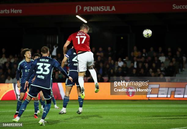 Matt Smith of Salford City scores the team's first goal during the Carabao Cup Second Round match between Salford City and Leeds United at Peninsula...