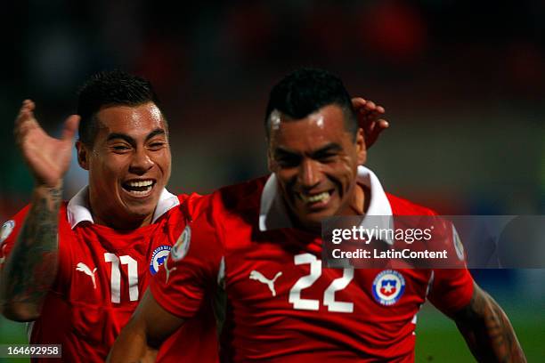 Esteban Paredes of Chile celebrates a goal against Uruguay during a match between Chile and Uruguay as part of the 12th round of the South American...