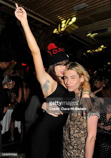 Willa Keswick and Kyle Devolle attend the ABSOLUT Elyx launch party at The Box Soho on March 26, 2013 in London, England.
