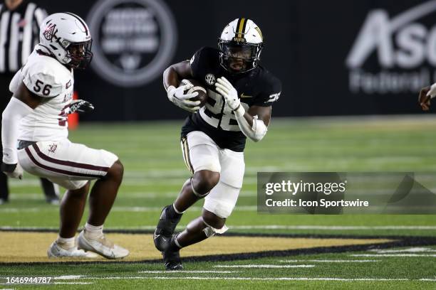 Vanderbilt Commodores running back Sedrick Alexander carries the ball during the game between the Vanderbilt Commodores and the Alabama A&M Bulldogs...