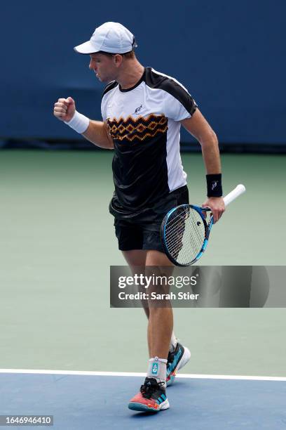 James Duckworth of Australia celebrates a point against Felipe Meligeni Alves of Brazil during their Men's Singles First Round match on Day Two of...