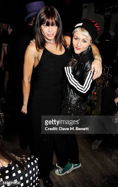 Willa Keswick and Jaime Winstone attend the ABSOLUT Elyx launch party at The Box Soho on March 26, 2013 in London, England.