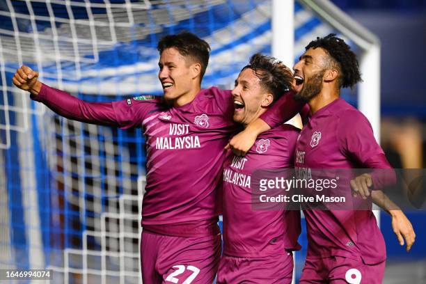 Ryan Wintle of Cardiff City celebrates with teammates after scoring the team's second goal during the Carabao Cup Second Round match between...