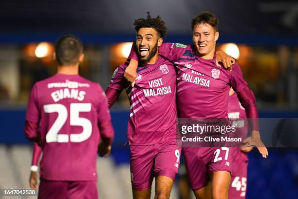 Kion Etete of Cardiff City celebrates with teammates after scoring the team's third goal during the Carabao Cup Second Round match between Birmingham...