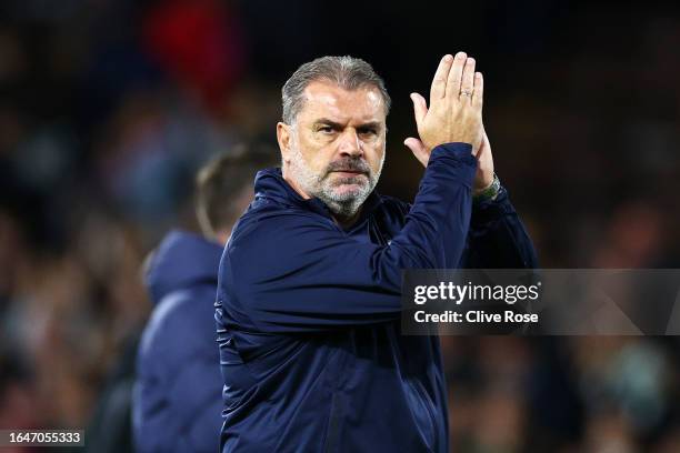 Ange Postecoglou, Manager of Tottenham Hotspur looks dejected as he applauds the fans after his team loses in the Carabao Cup Second Round match...