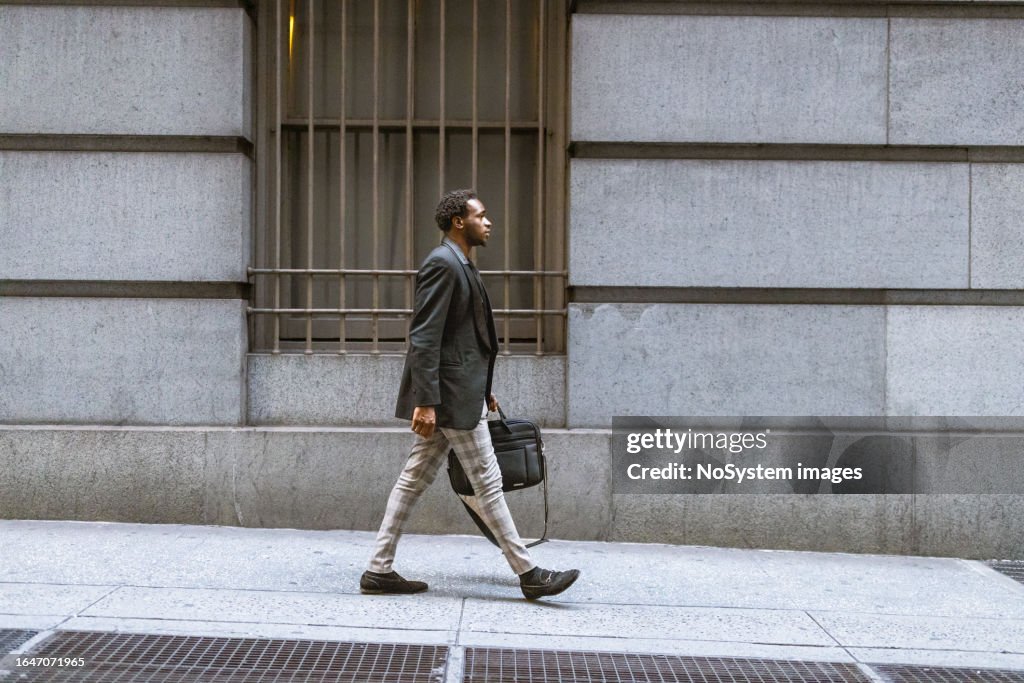 Businessman Rushing Businessman Rushing To The Office In Wall Street High-Res Stock Photo ...