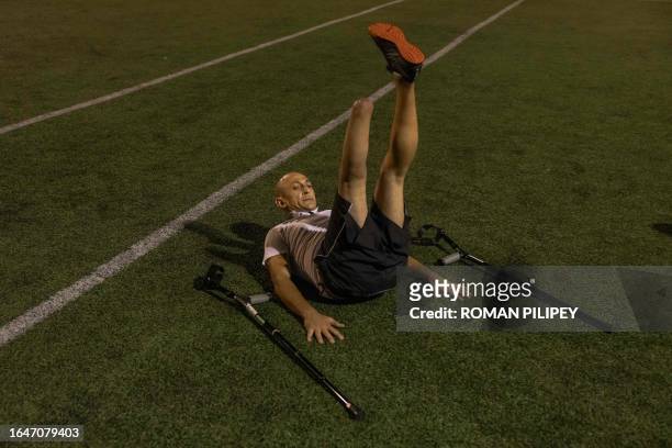 Oleg a Ukrainian officer in the 46th assault brigade, who lost his foot fighting Russian troops in Bakhmut attends a football training session in...