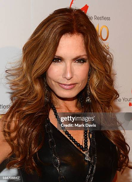 Actress Tracey E. Bregman poses at 'The Young & The Restless' 40th anniversary cake-cutting ceremony at CBS Television City on March 26, 2013 in Los...