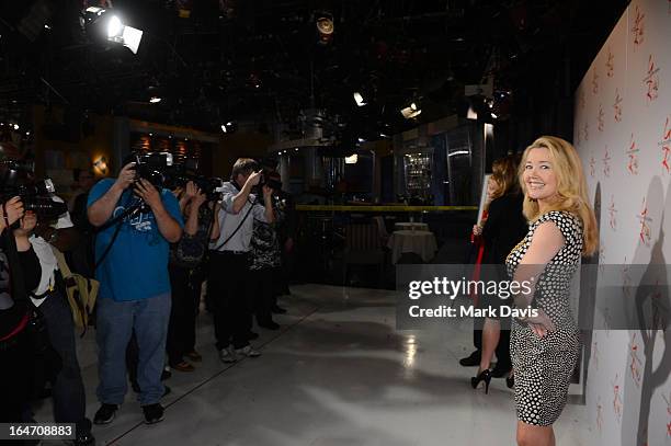 Actress Melody Thomas Scott poses at 'The Young & The Restless' 40th anniversary cake-cutting ceremony at CBS Television City on March 26, 2013 in...