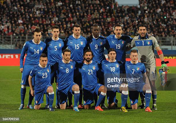 Italy's team poses before the FIFA 2014 World Cup qualifying football match Malta vs.Italy at the National Stadium in Malta on March 26, 2013. AFP...