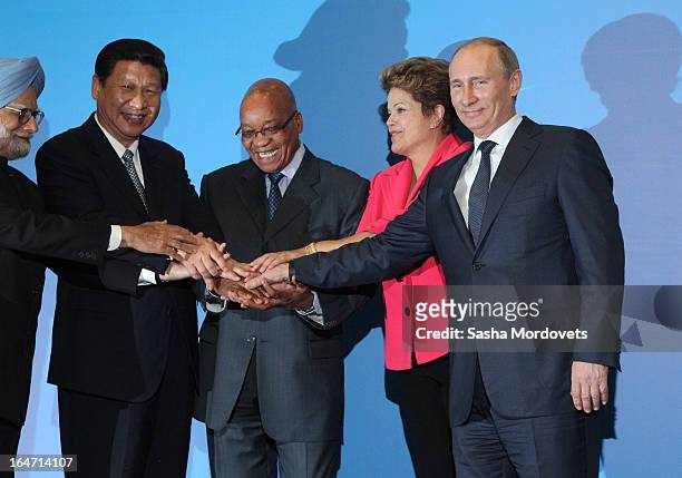 Indian Prime Minister Manmohan Singh, Chinese President Xi Jinping, South Africa President Jacob Zuma, Brazil's President Dilma Rousseff and Russian...