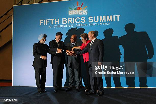 Indian Prime Minister Manmohan Singh, Chinese President Xi Jinping, South Africa President Jacob Zuma, Brazil's President Dilma Rousseff and Russian...