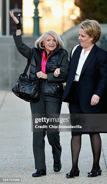 Edith Windsor waves as she and her lawyer Roberta Kaplan arrive at the Supreme Court March 27, 2013 in Washington, DC. The Supreme Court will hear...