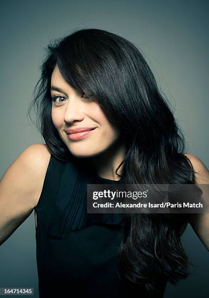 Actor Olga Kurylenko is photographed for Paris Match on February 12, 2013 in Paris, France.