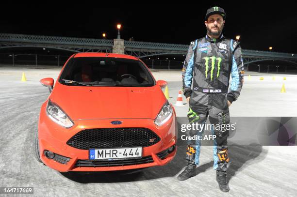 Driver Ken Block of Hoonigan Racing Division Team, formerly known as the Monster World Rally Team, poses for a photo with a Hungarian plate Ford...