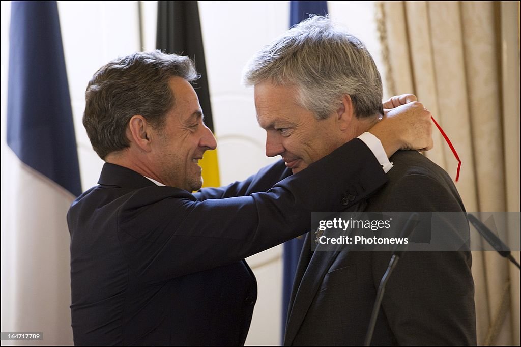 Nicolas Sarkozy Presents The French Legion of Honour To Didier Reynders