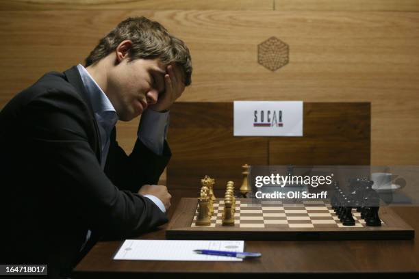 Magnus Carlsen, the world's number one chess player, prepares to play Israel's Boris Gelfand in the Candidates Tournament at the IET on Savoy Place...